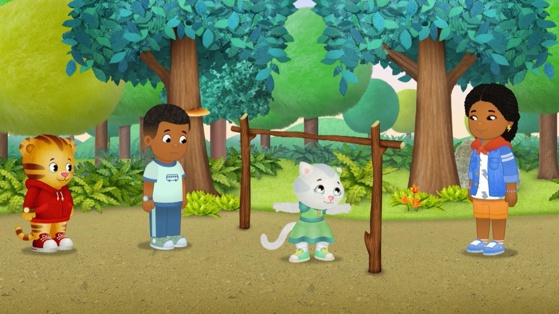 Daniel explores at day camp on a hike.