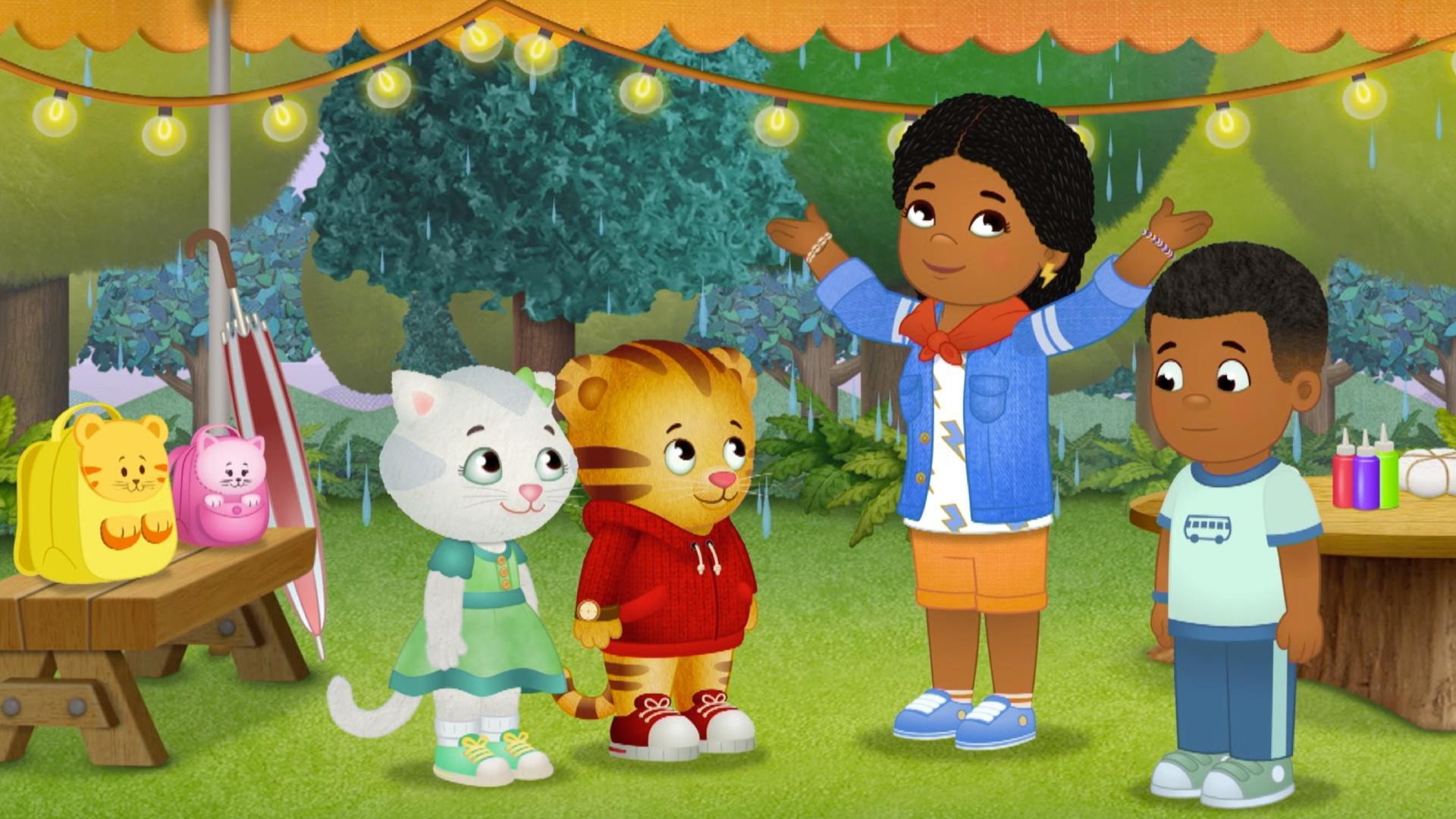 Daniel ties dyes a shirt with different colors.