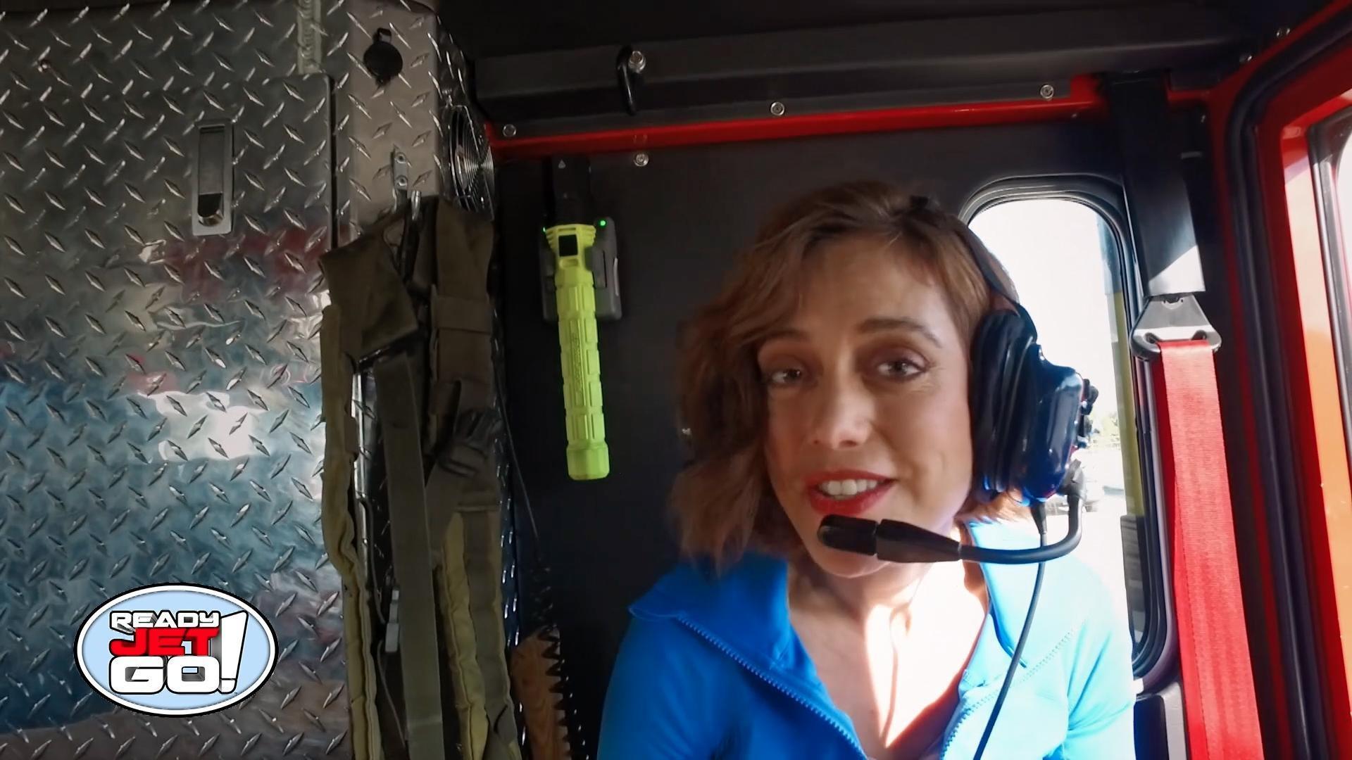 Astronomer Amy Mainzer demonstrates something called the doppler effect.