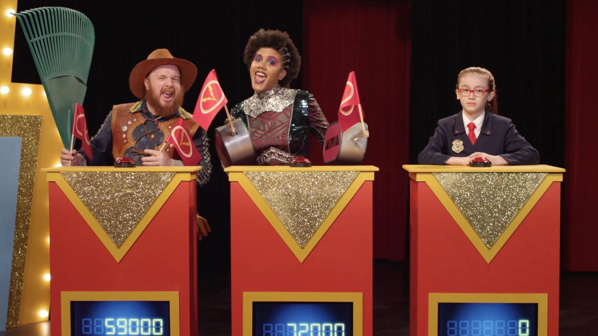 Oona and Otis fix the thermostat. Olympia distracts the show host.