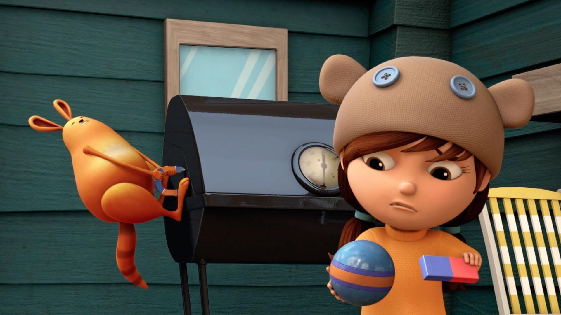 The kids test out what magnets are attracted to.