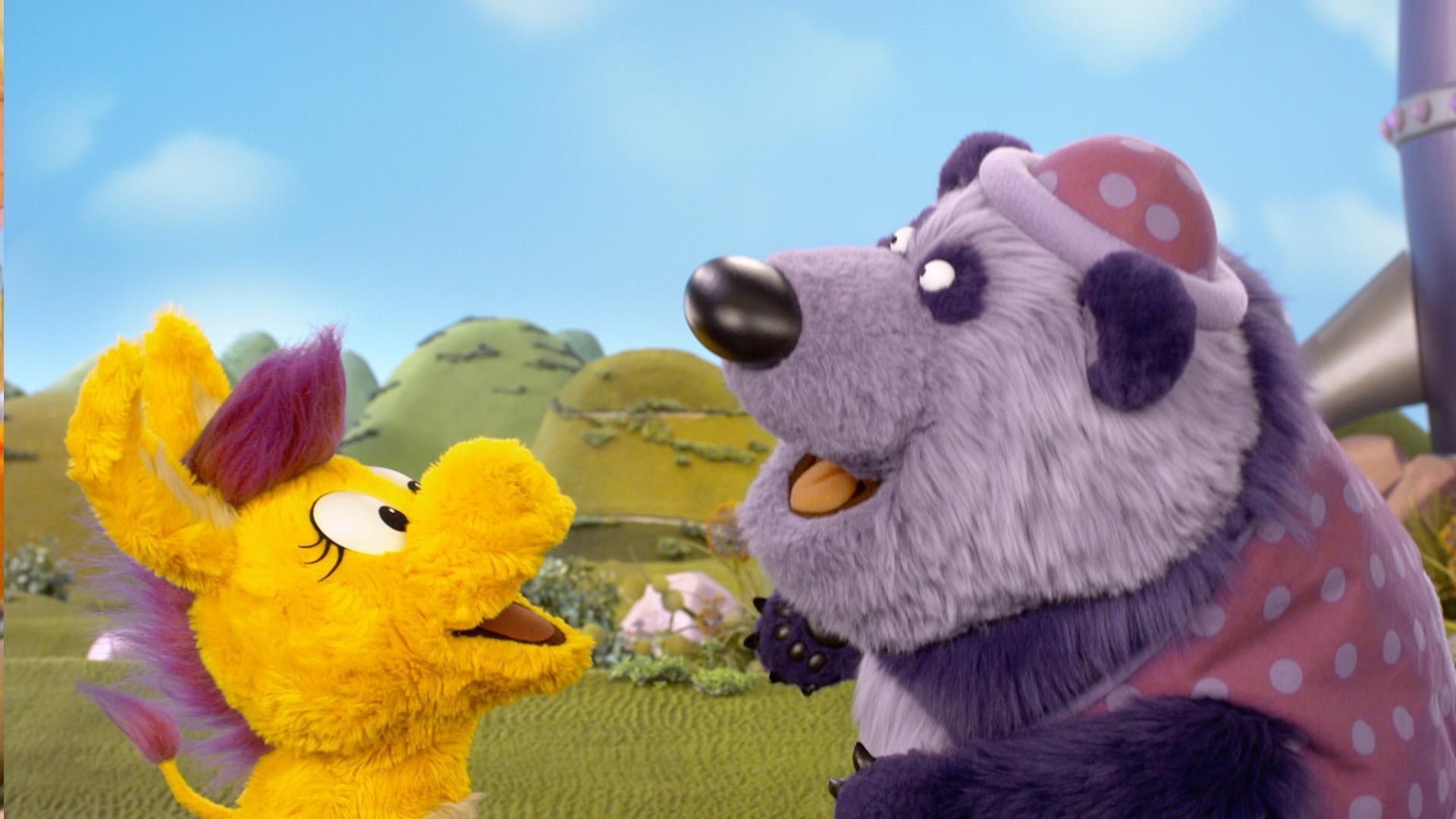 Purple Panda teaches Donkey Hodie how to dance the Purple Polka Dot Polka.