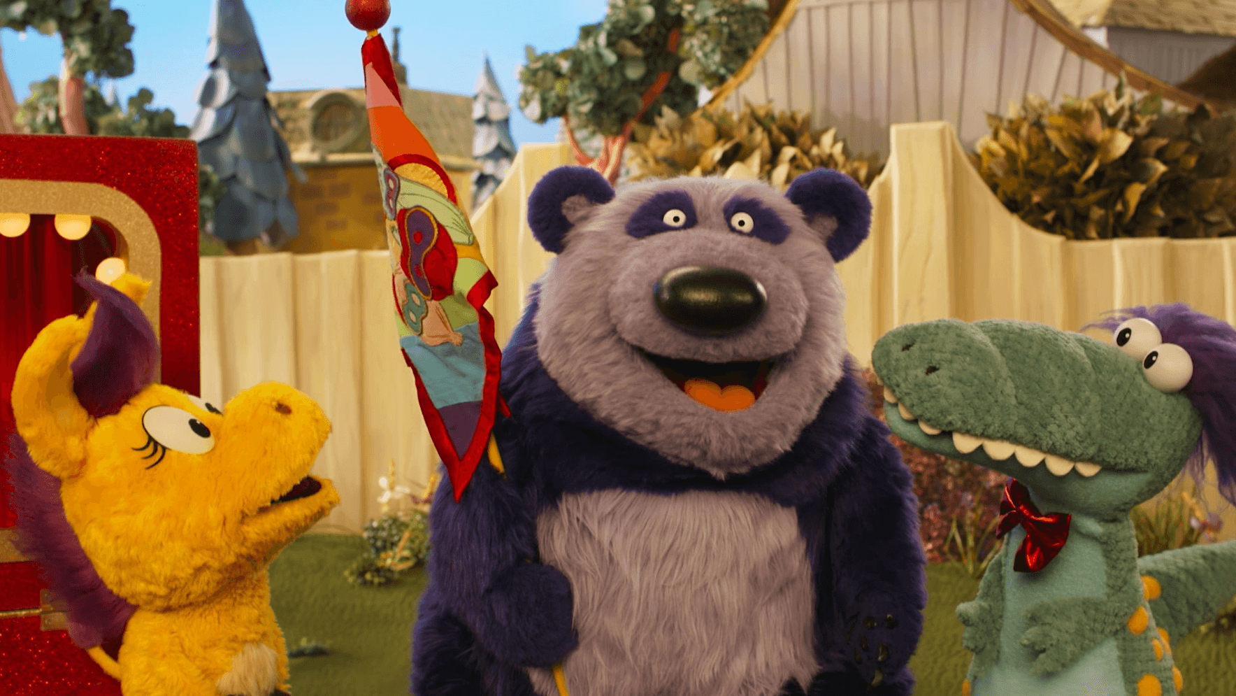 Panda’s pals cheer him on during a gameshow. / Donkey and Panda host King Friday.