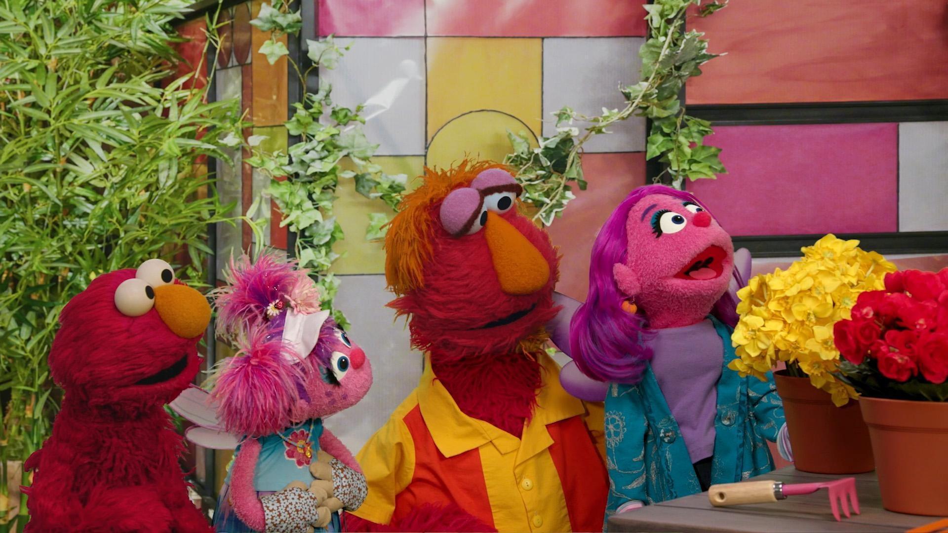 Elmo and his daddy and Abby and her mommy teach kids about their feelings.