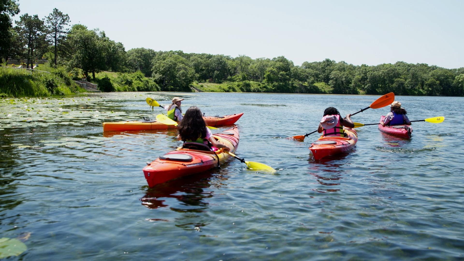 Ranger Shania takes the girls kayaking to get a different view of the environment.