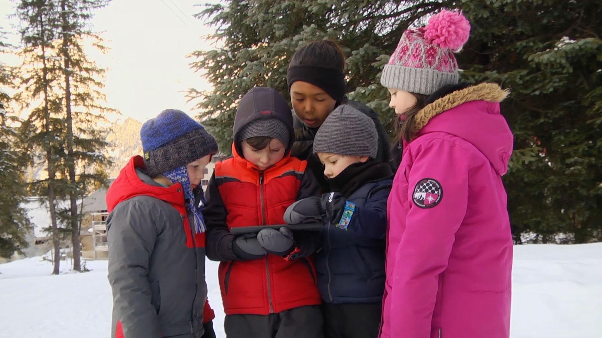 Kids set out to snowshoe the Winner Creek Trail in Girdwood, Alaska.
