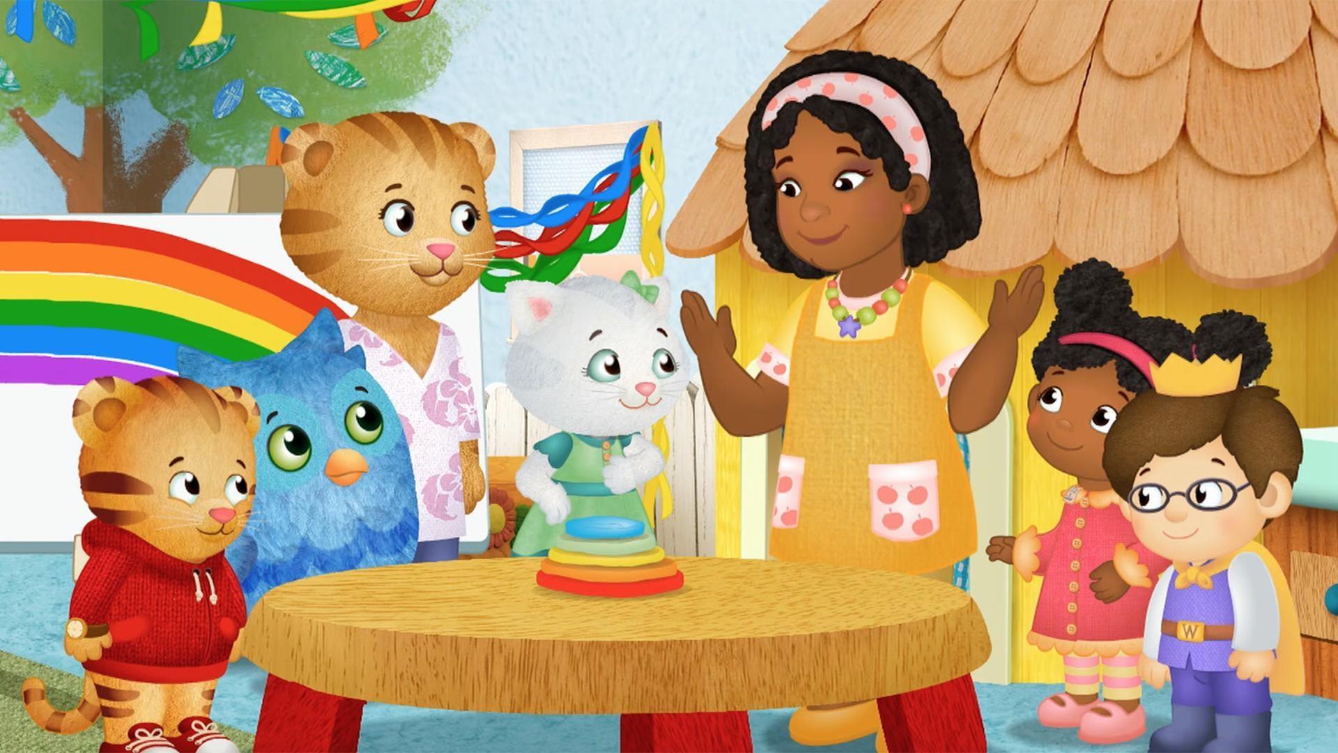 The children help Teacher Harriet with an art project. / It's Teacher Harriet's Birthday!