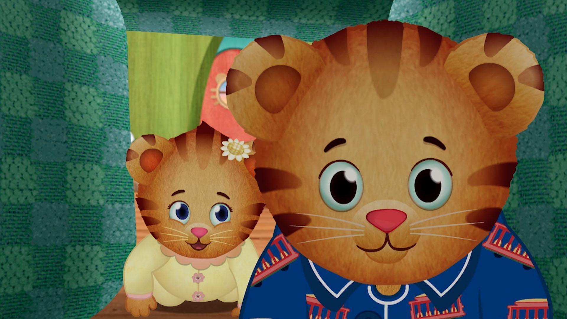 Daniel and Margaret wear PJs and play on an obstacle course in their living room