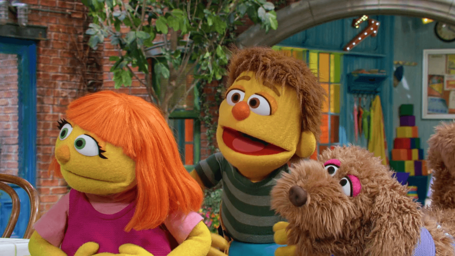 Sam and Julia teach Elmo and Tango how to calm down by doing the wet dog wiggle.