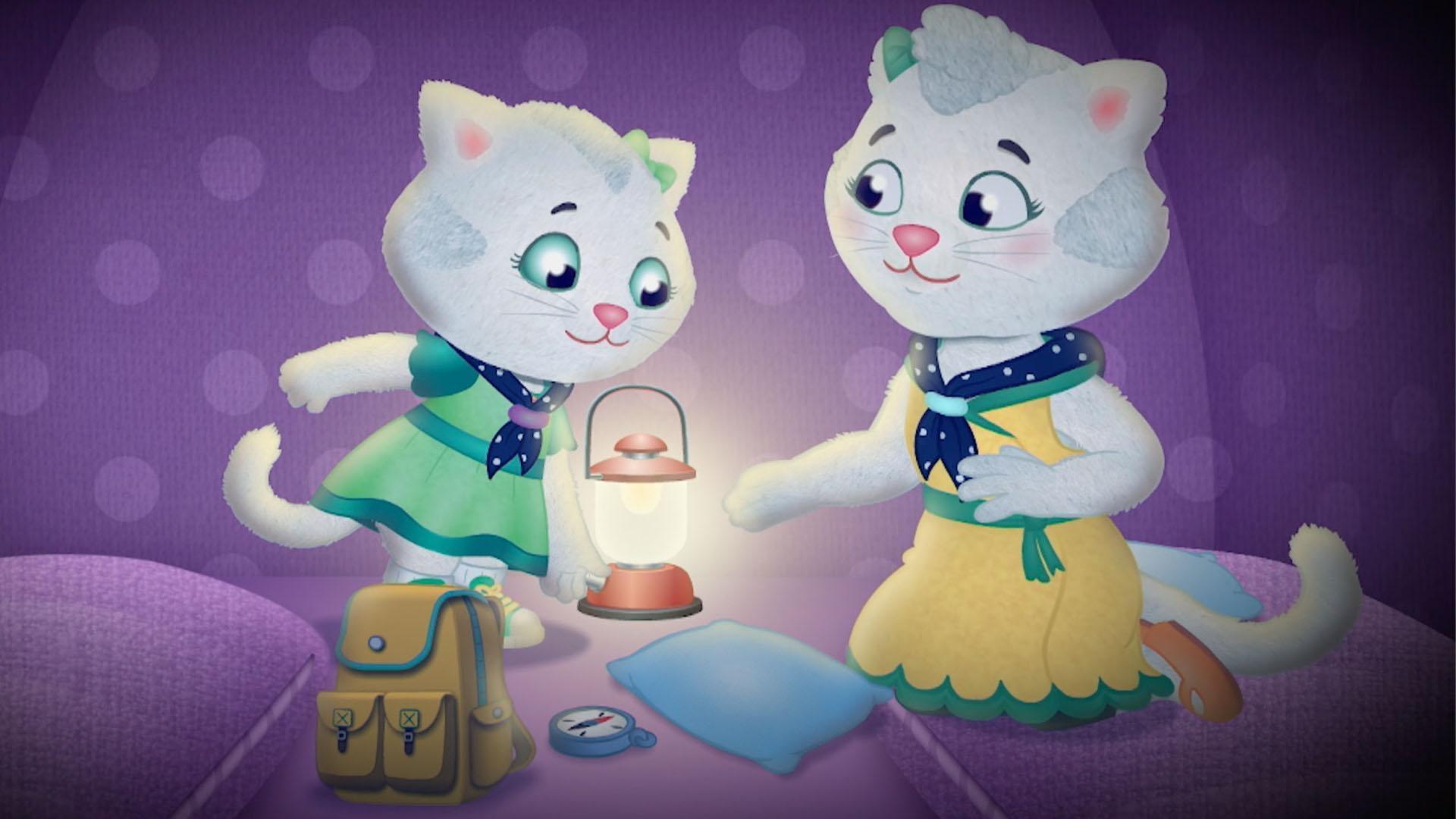 Henrietta and Katerina play a flashlight memory game while camping.