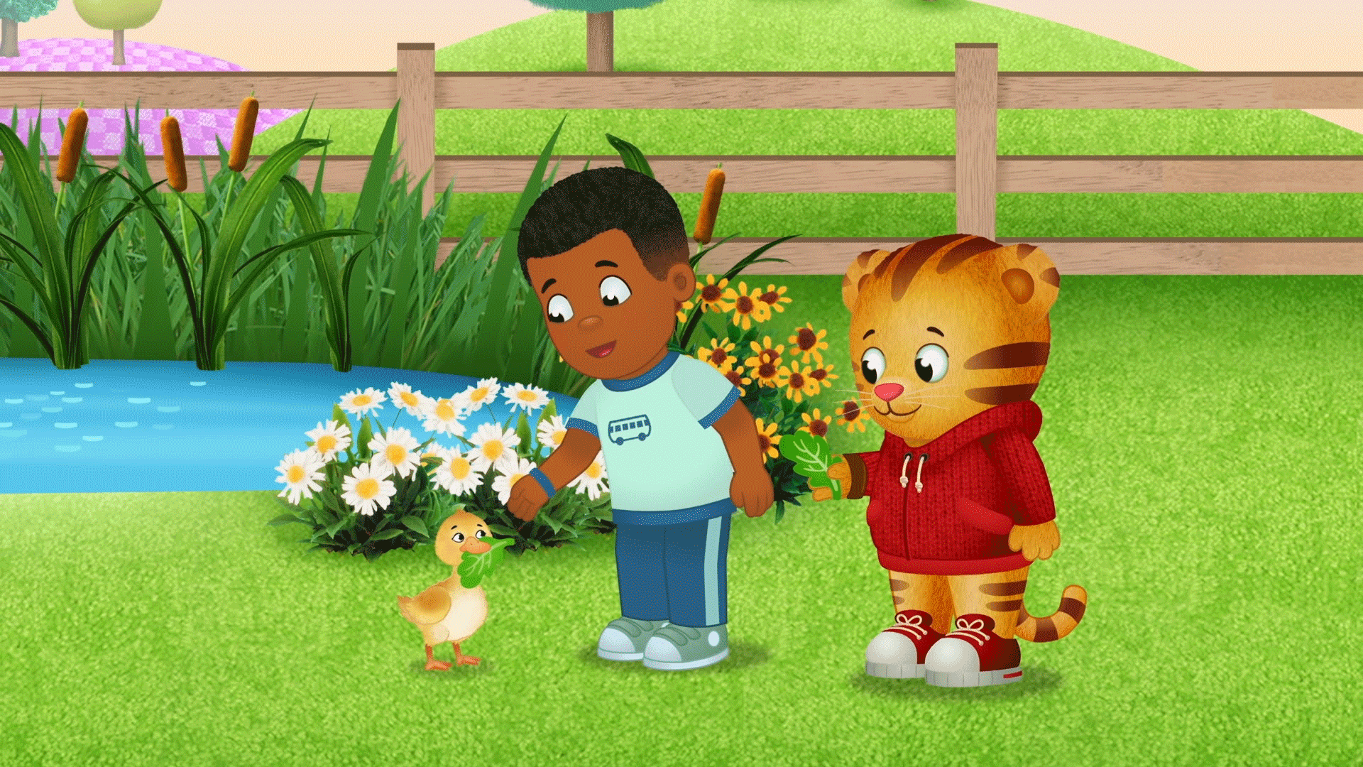 Max figures out how to feed the ducks one at a time!