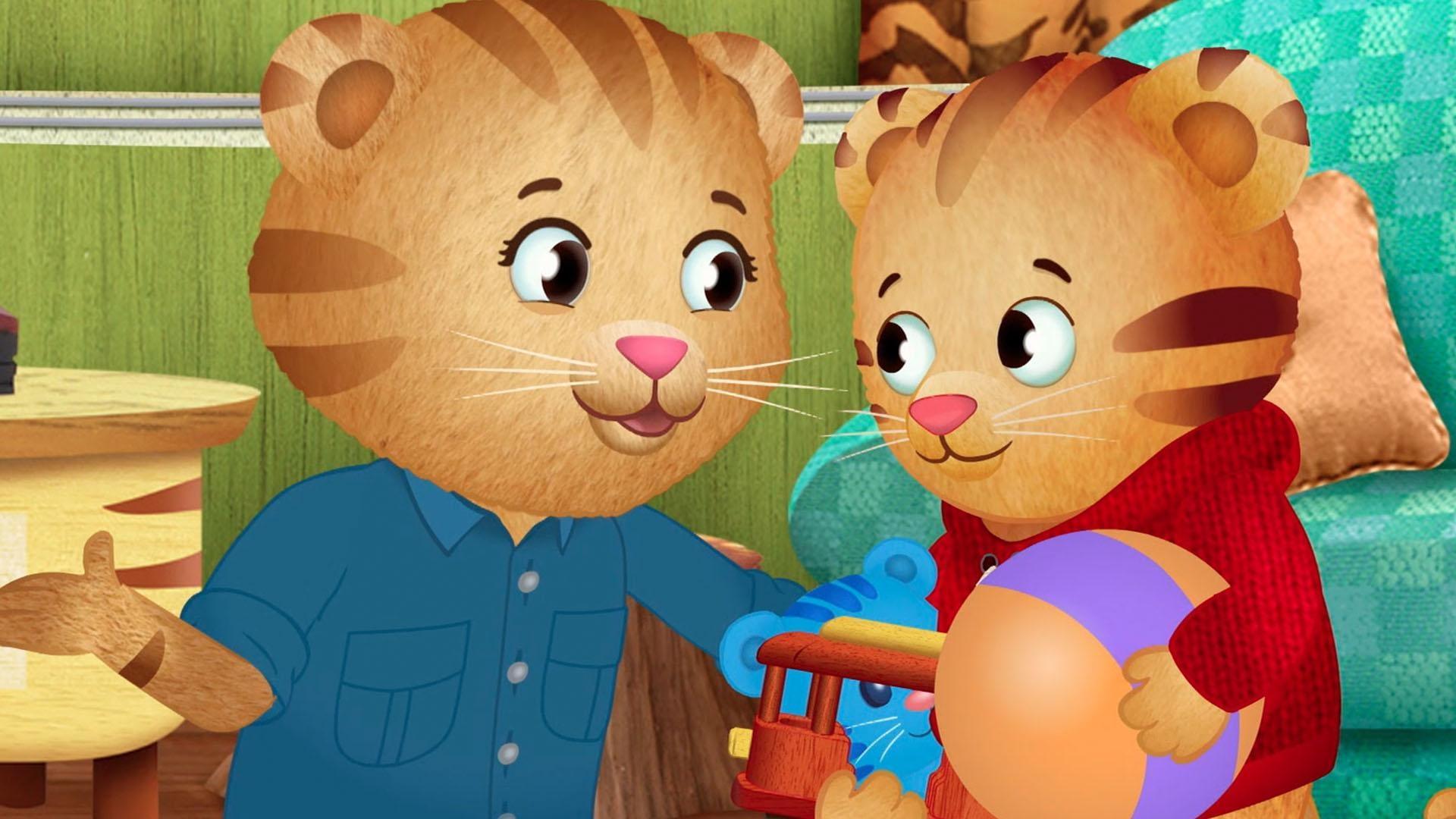 Daniel is spending the day with Mom Tiger! They fix up an old wagon together.