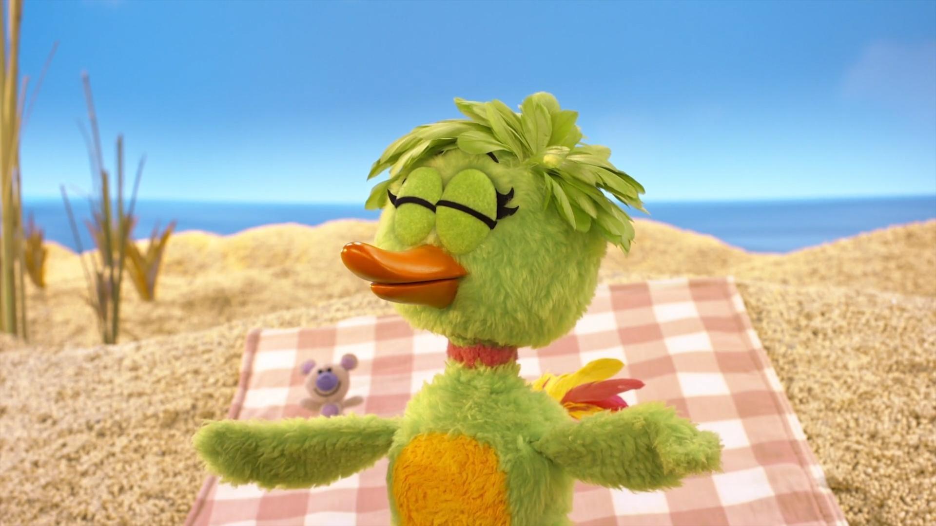 After a busy morning helping her pals, Duck Duck enjoys me-time at the beach.