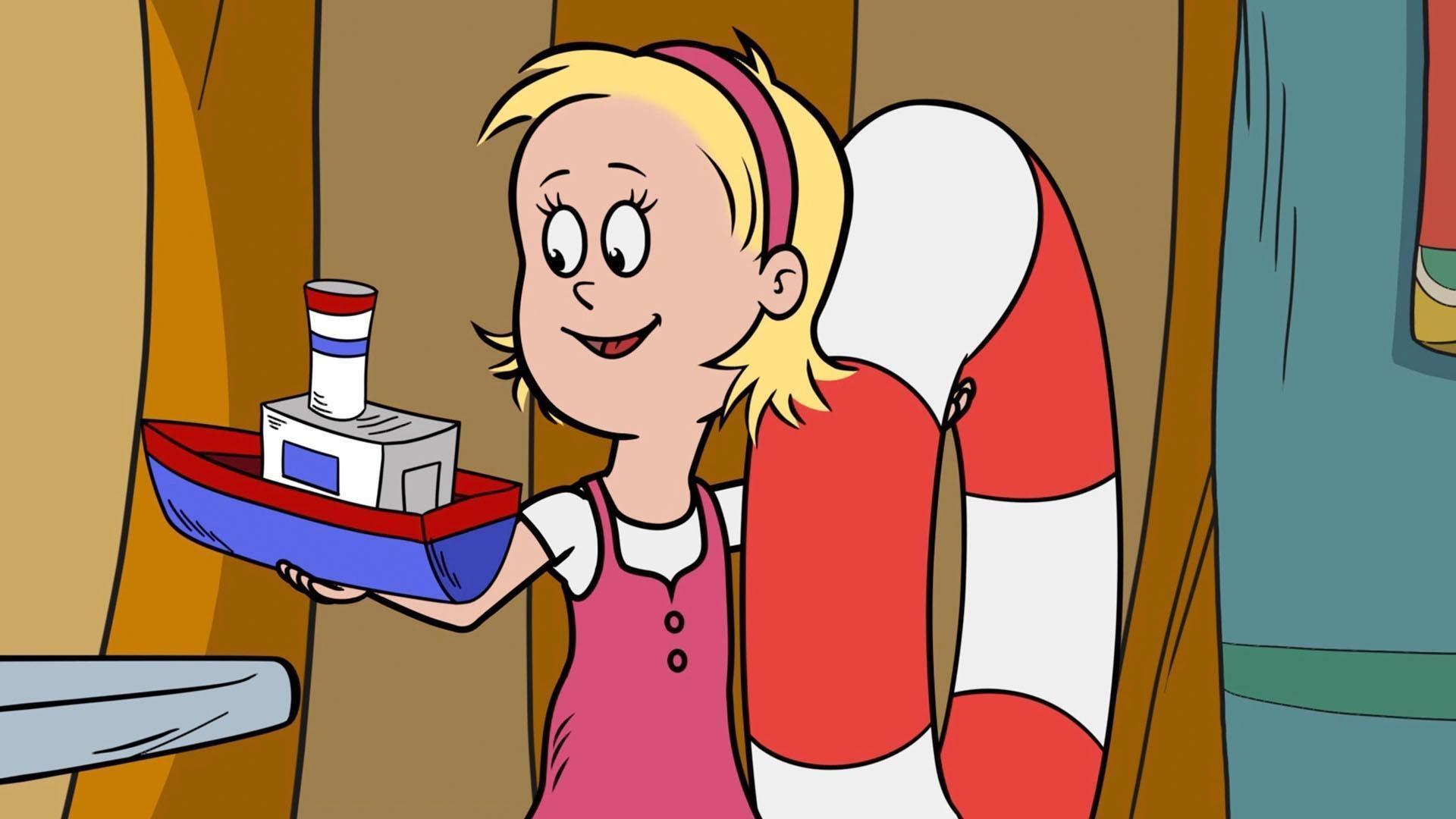 Sally descubre que dos juguetes pesan lo mismo, a pesar de que tienen tamaños diferentes.