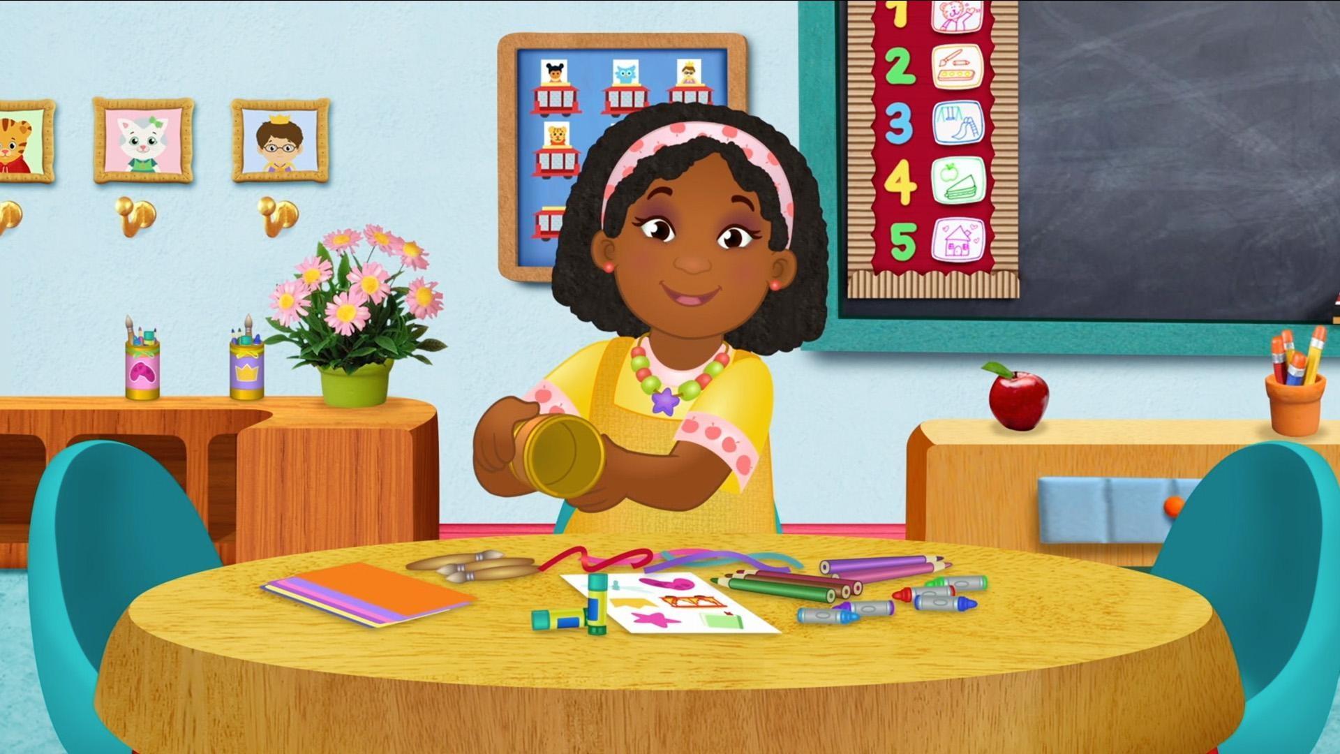 Teacher Harriet makes craft containers for her students.