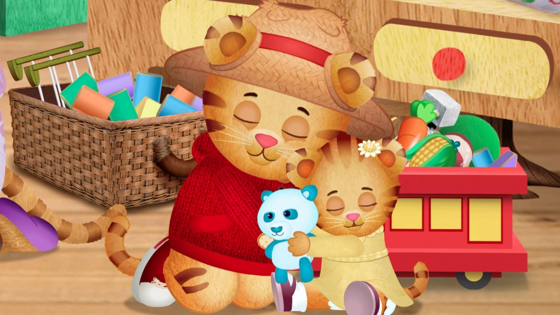 Daniel builds a block archway and Margaret knocks it over.