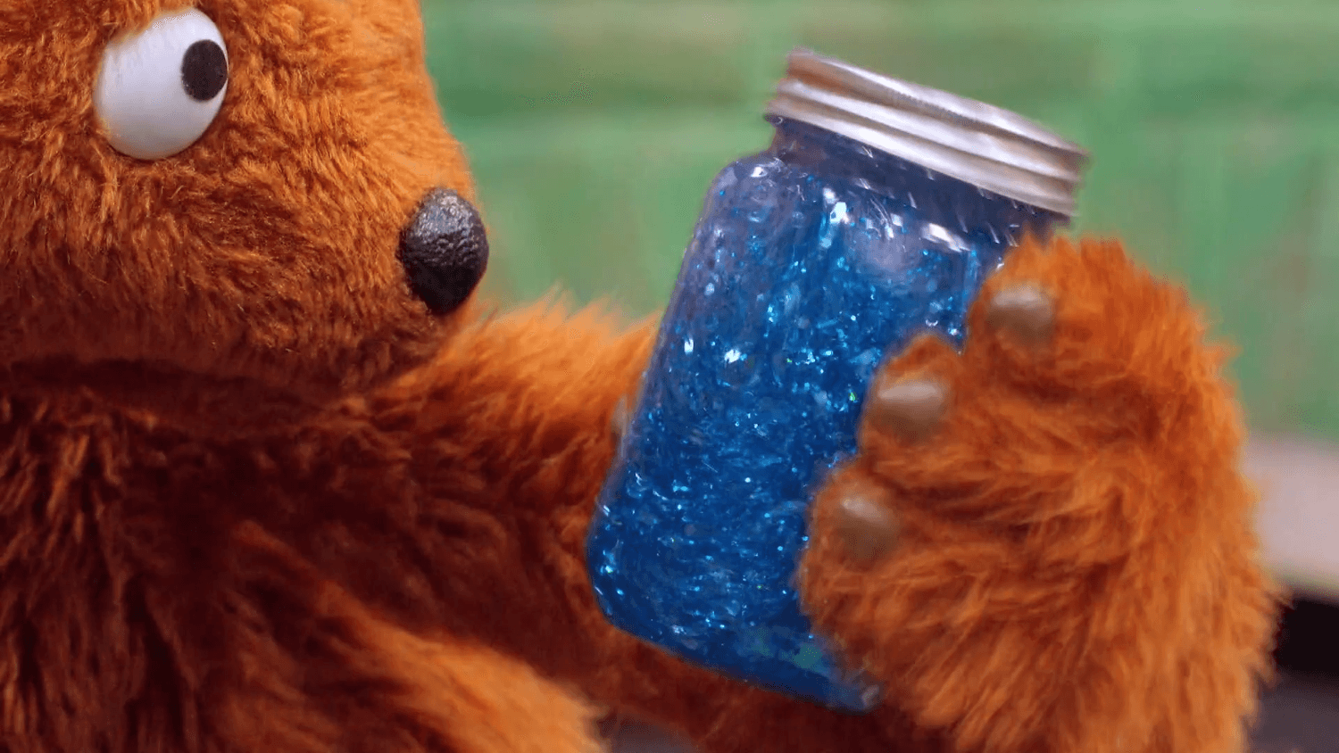 Rudy experiences some big feelings and his friends help him calm down by using a glitter jar.