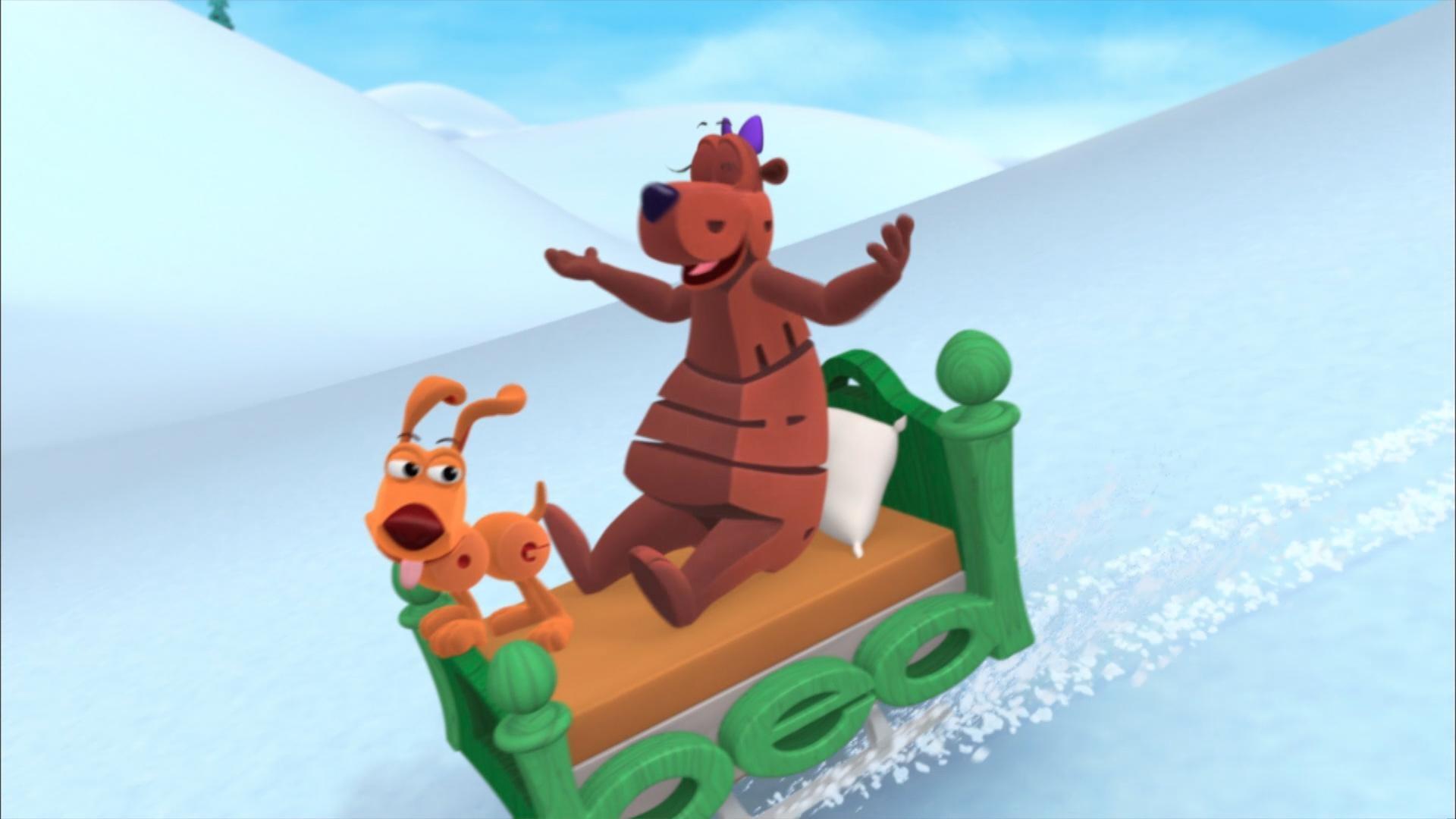 Bear gets help sledding in the snow. / Shark is misunderstood.
