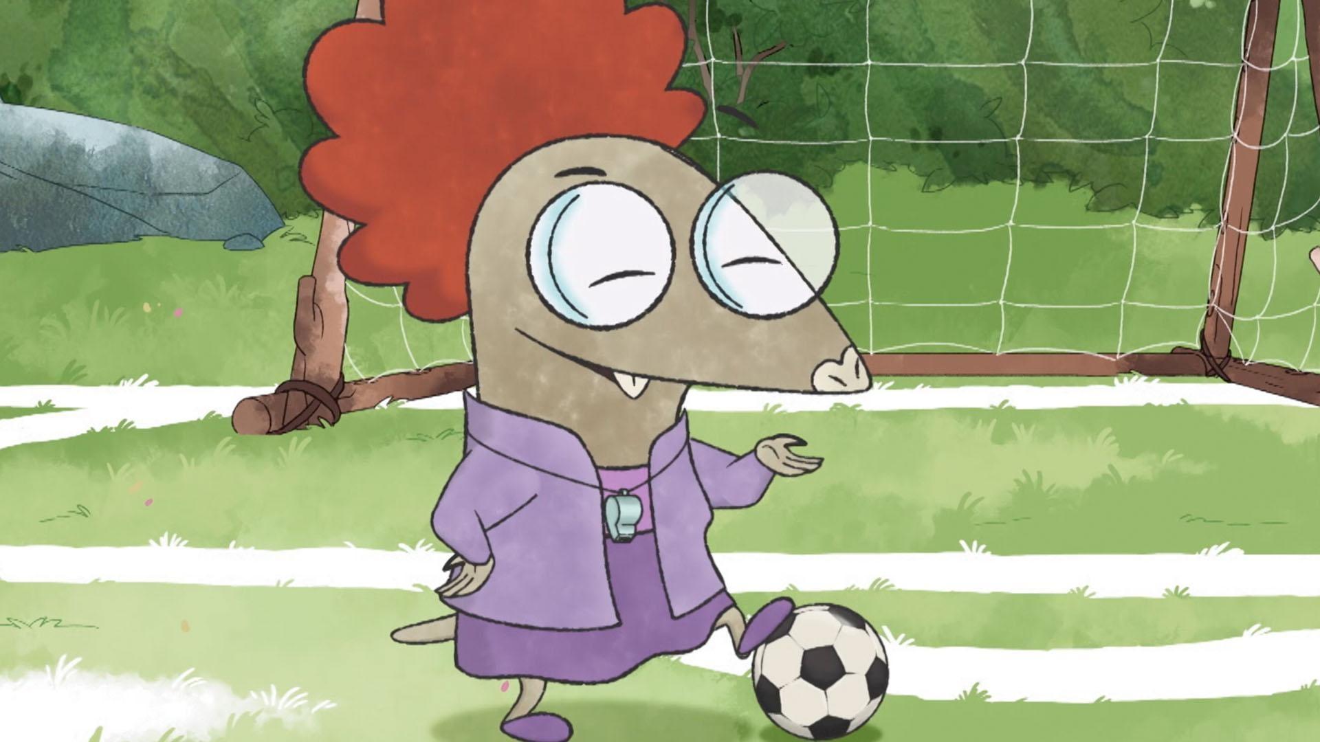 Ms. Mole teaches the kids some of the rules of playing soccer.