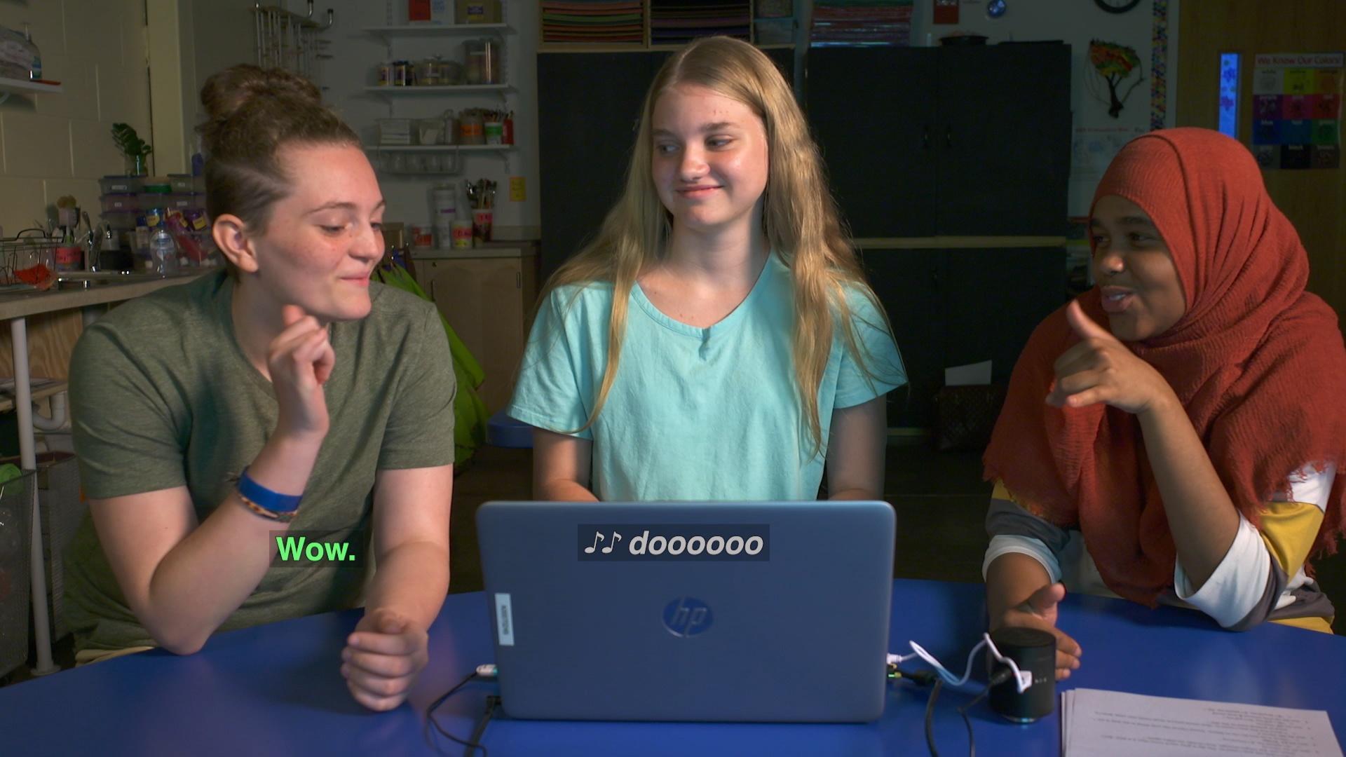 The SciGirls experience music a new way through technology and plan their visual display.