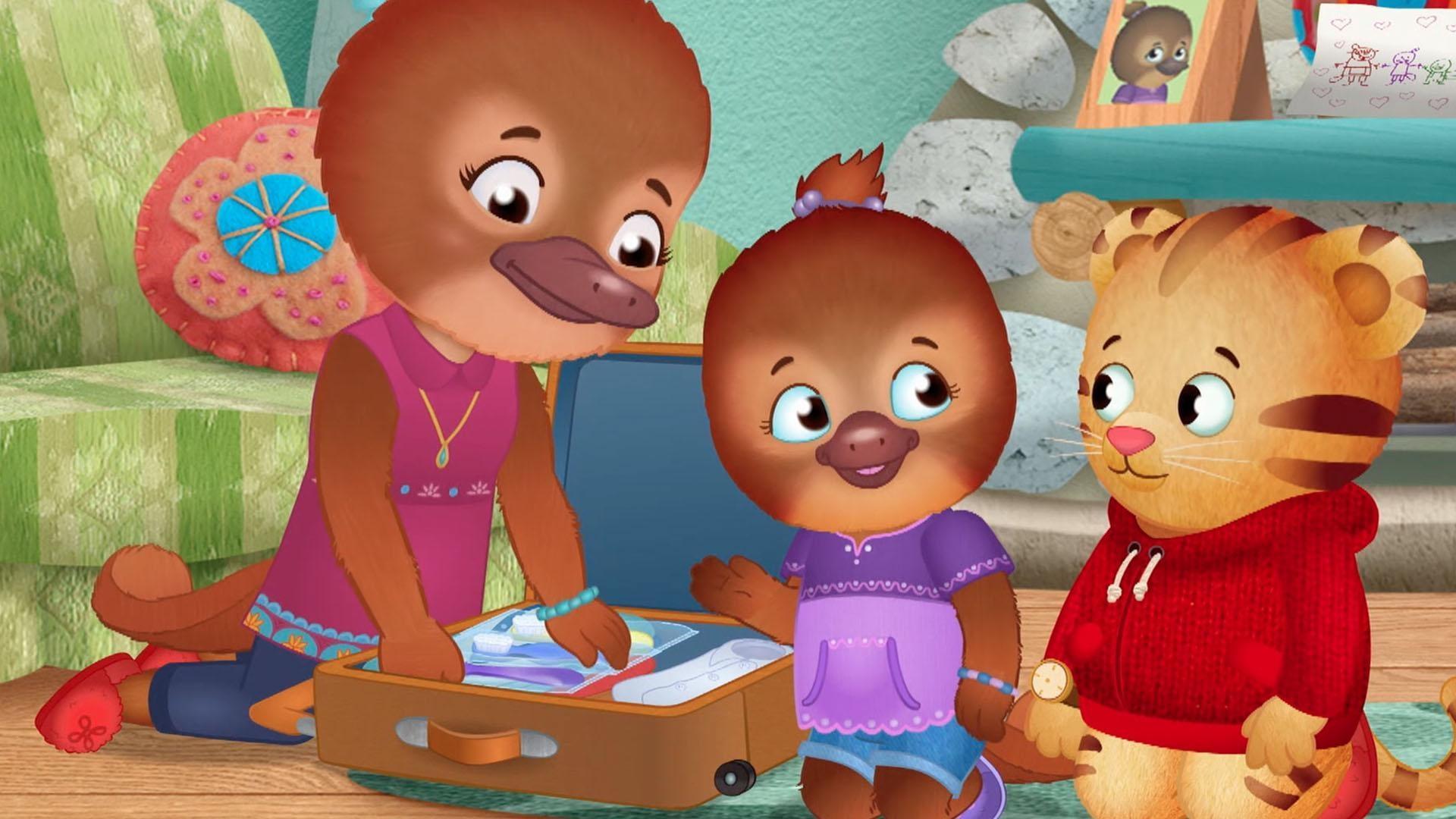 Jodi and Daniel help Dr. Plat pack her suitcase for a trip away from home.