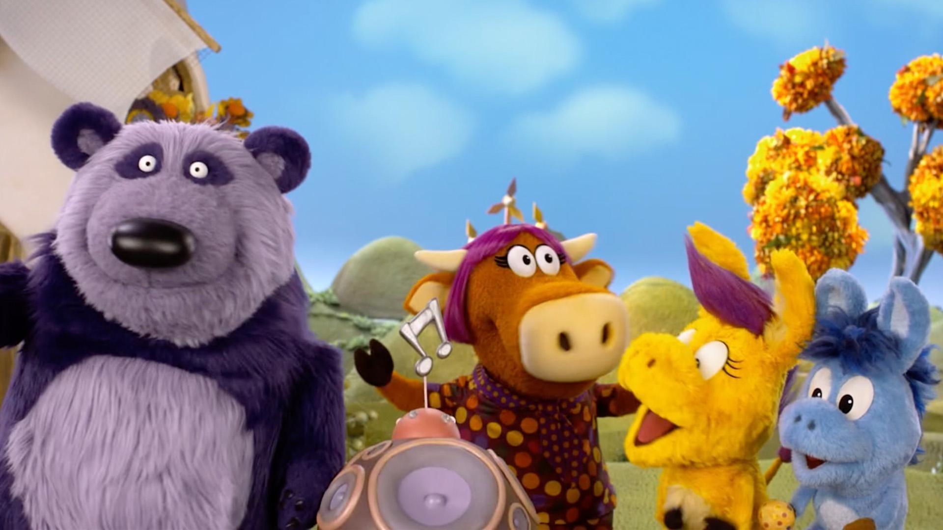 Donkey, Panda, and Cousin dance with Harriett's newest invention, the Music Racer.