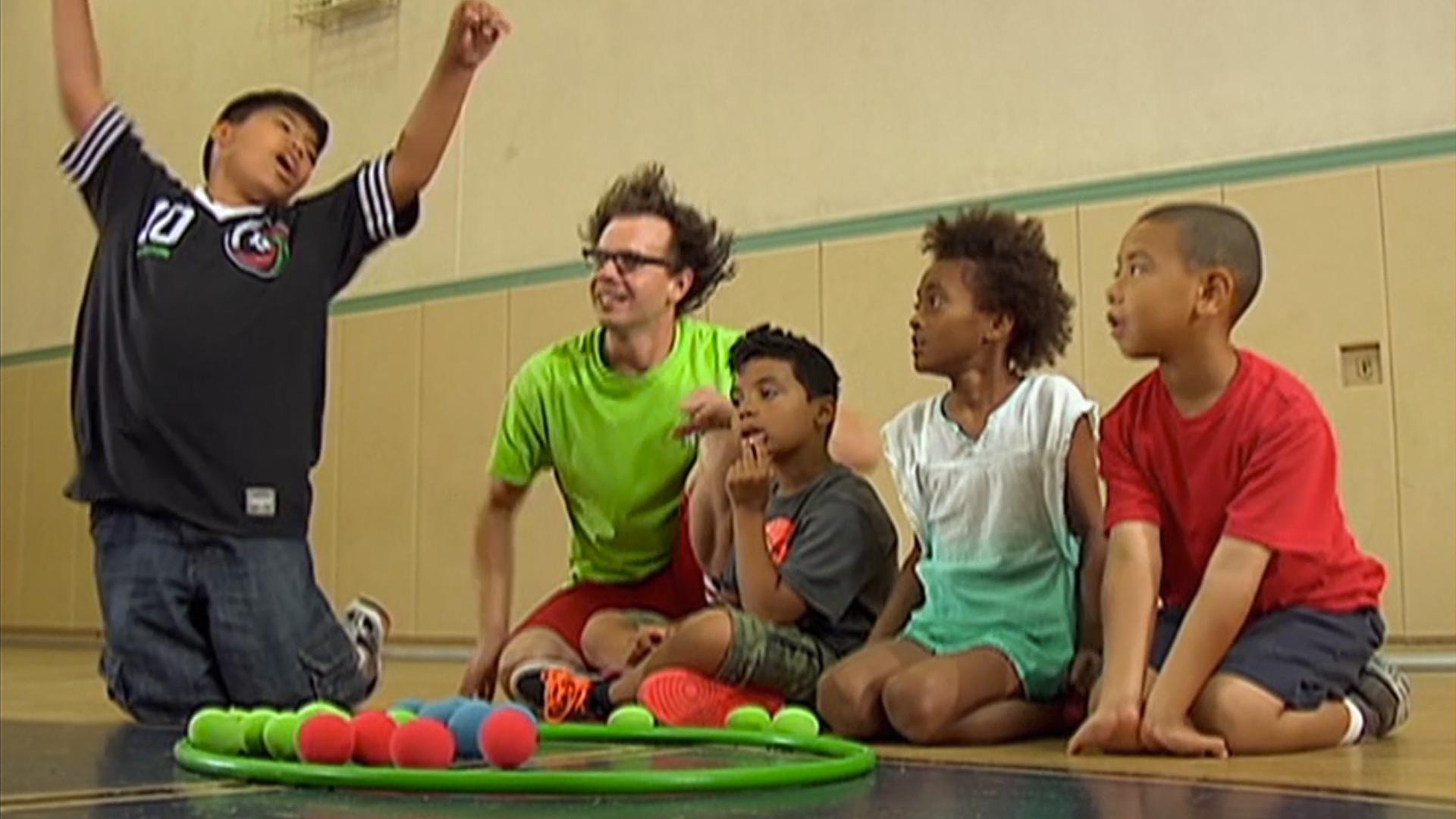 Harry leads his campers in a game of “Chomp, Nibble, Grow, Grow, Grow.”