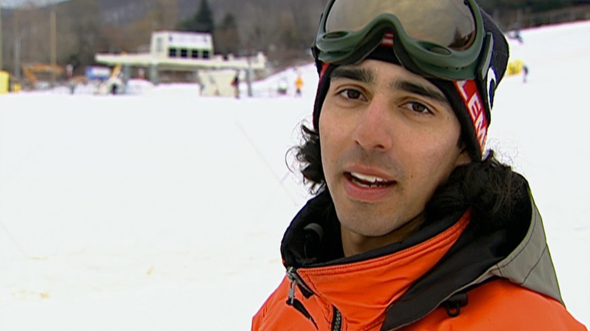 His first time snowboarding, Harry boasts he will perform a “360” by the end of the day.