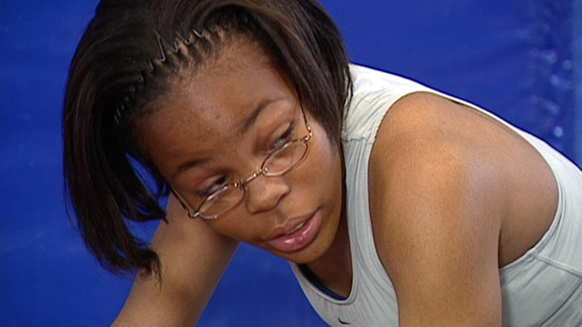 Bianca complains about her starting position on the inside lane behind other runners.