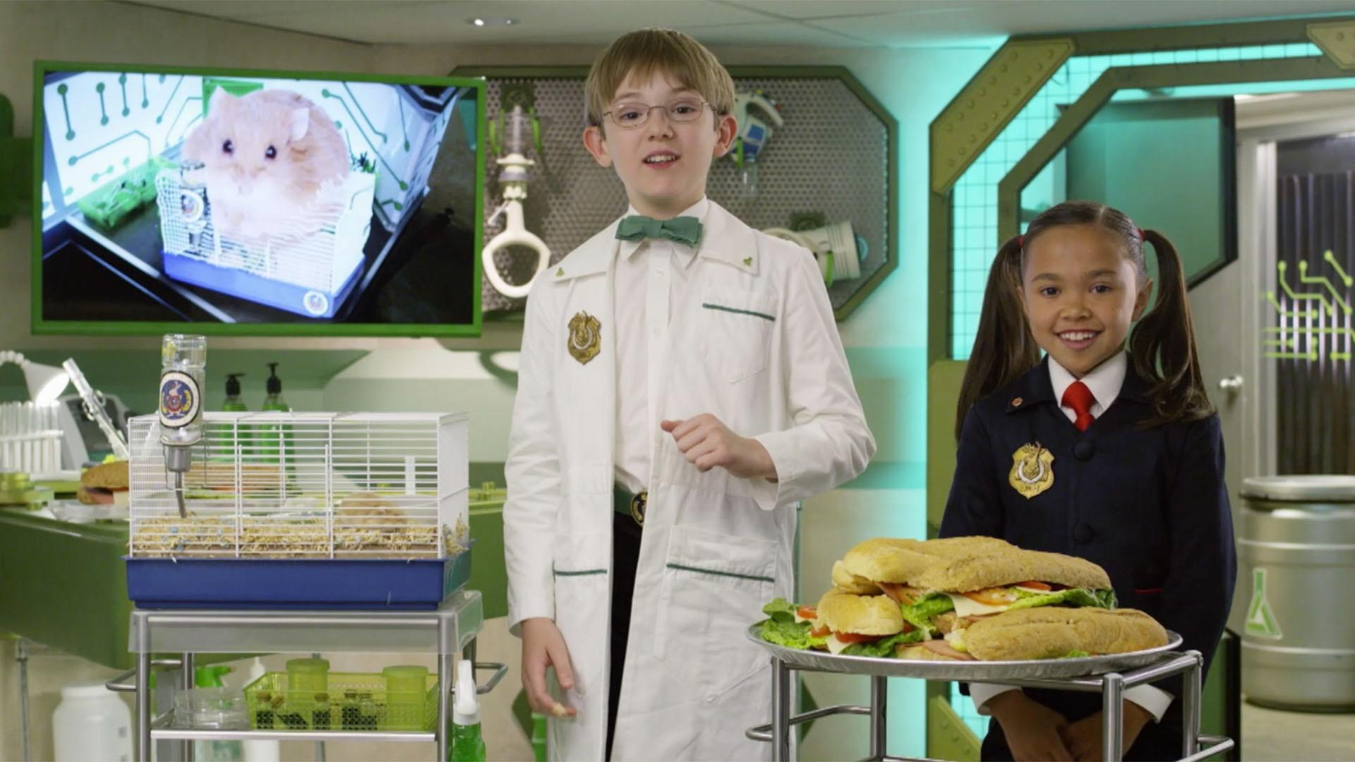 Oscar explains how to feed the Odd Squad hamster.