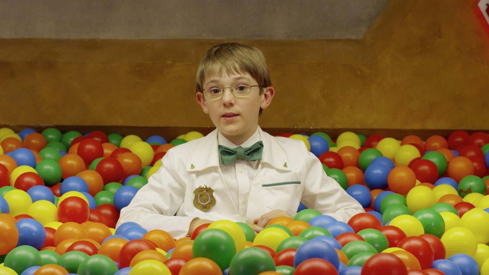 Oscar shows off the Odd Squad Ball Room where Odd Squad has important meetings.