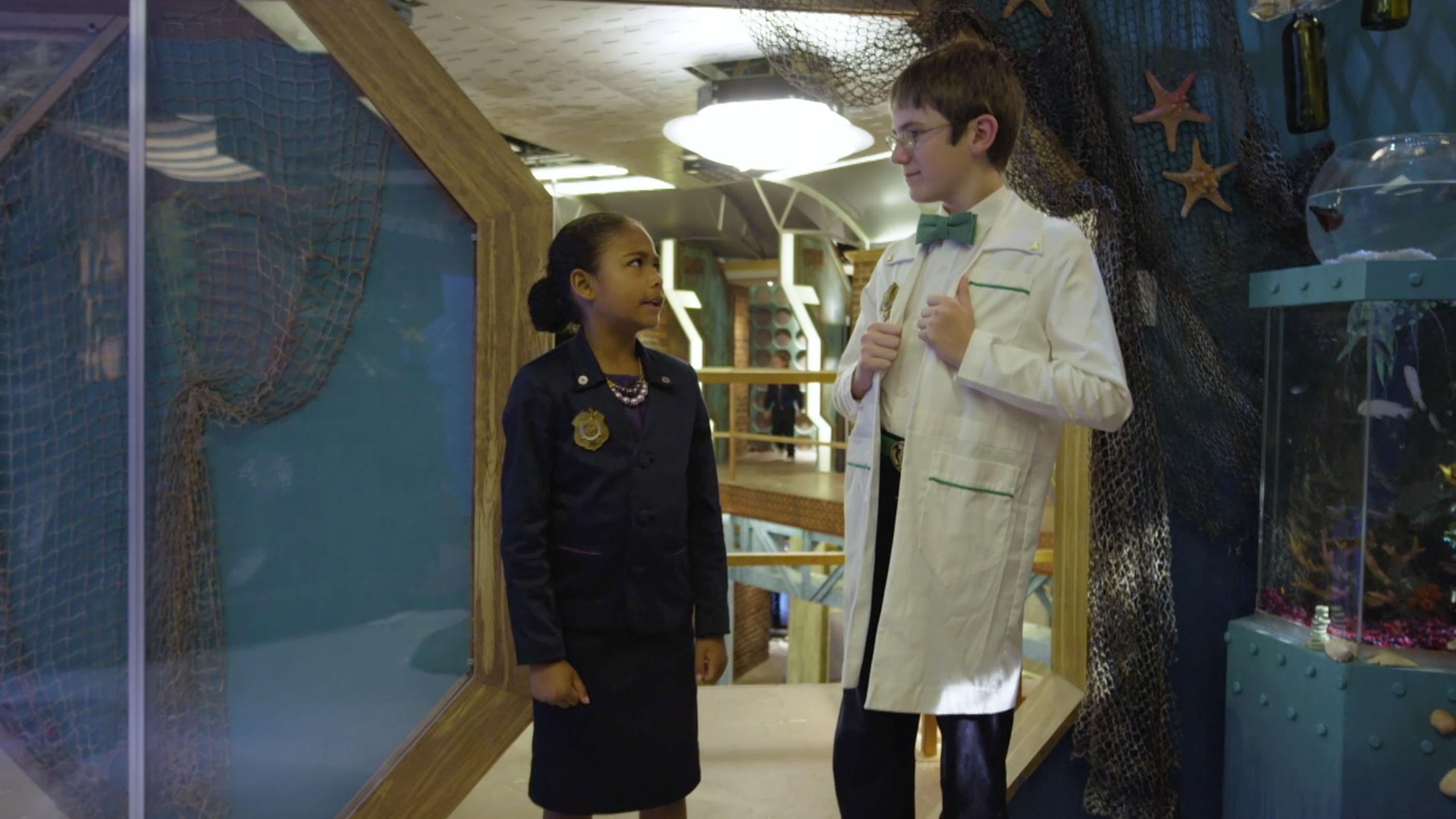 Ms. O Shows Oscar a new room in Headquarters.