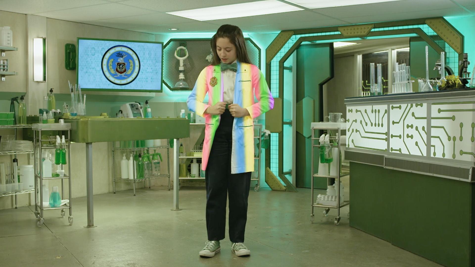 Oona explains the features of the Odd Squad scientist's lab coat.