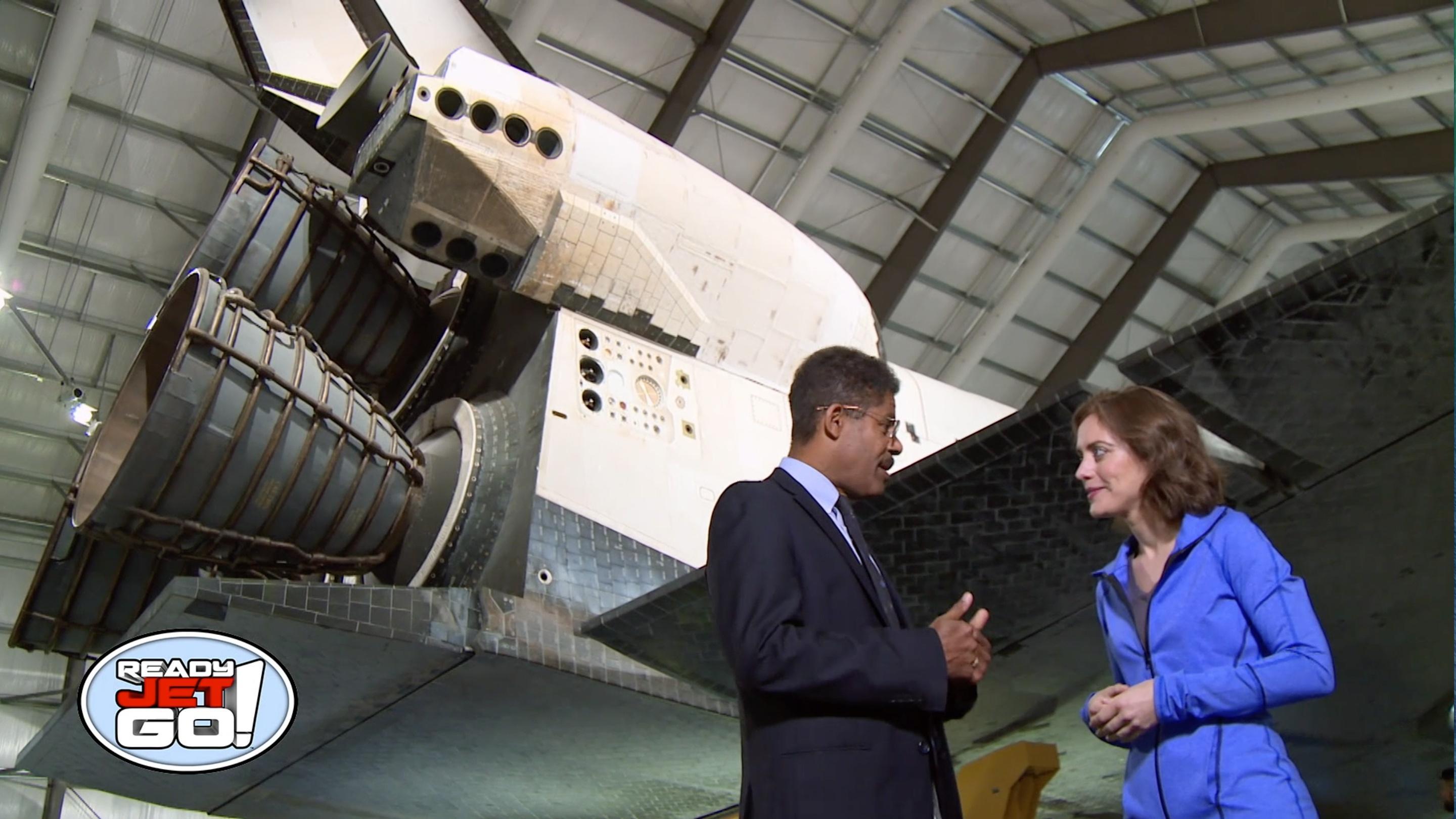Astronomer Amy Mainzer meets with the curator of Aerospace Science