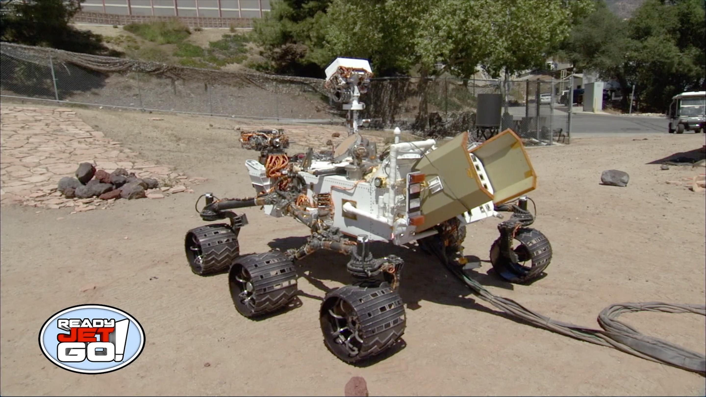 Astronomer Amy Mainzer visits the Mars Yard at NASA's Jet Propulsion Laboratory.