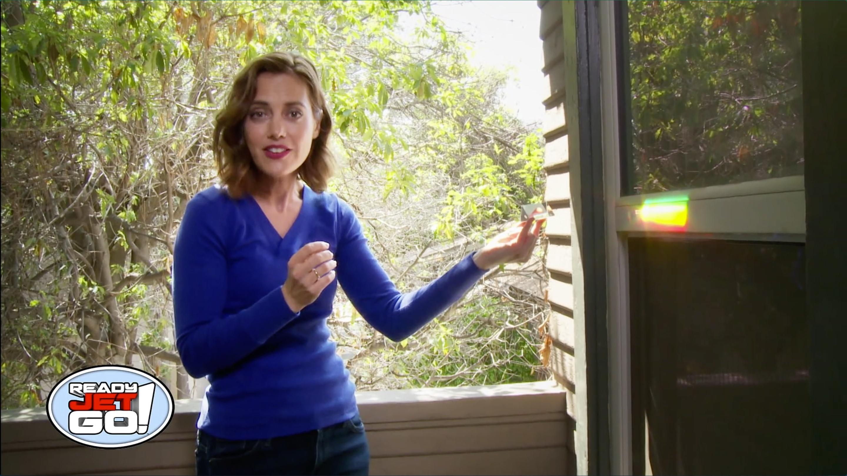 Astronomer Amy Mainzer shows how a prism can split light into a rainbow of colors.