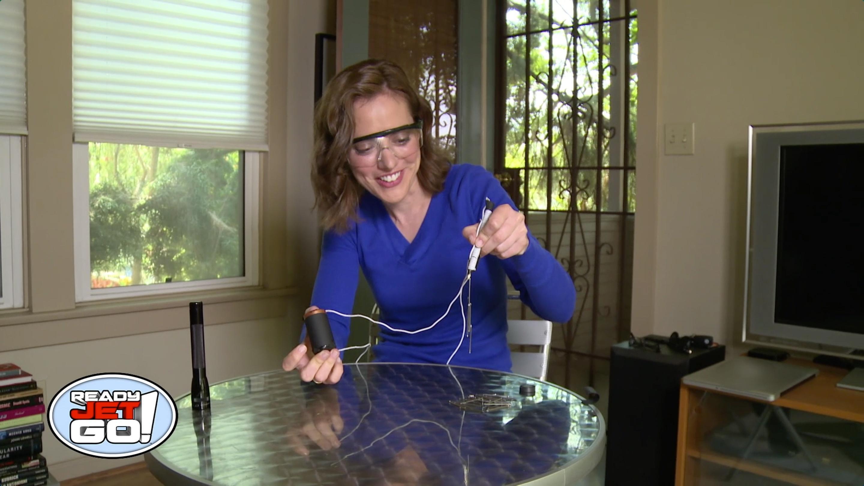 Astronomer Amy Mainzer creates an electromagnet.