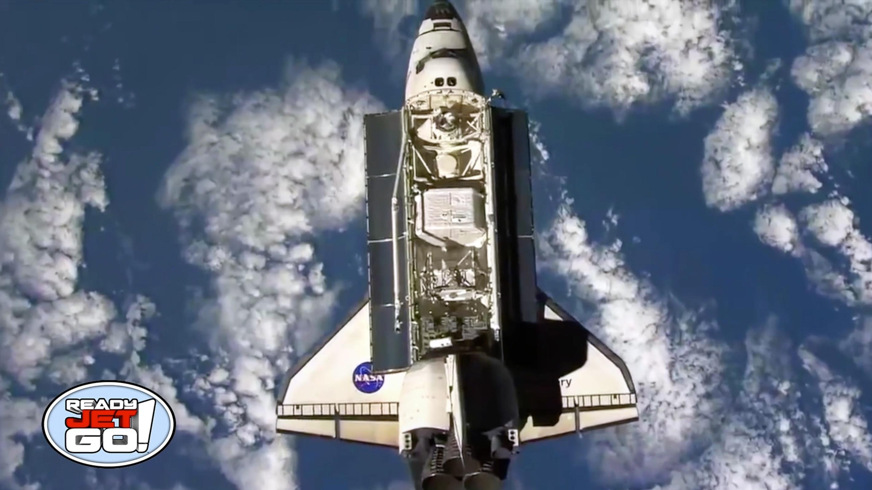 Amy Mainzer learns more about the Endeavor's payload bay.
