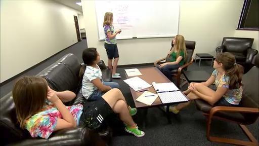 The SciGirls meet with Victoria, a Communications PhD student at Stanford.