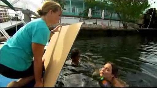SciGirls experience first-hand what dolphins will see when they look in the mirror.