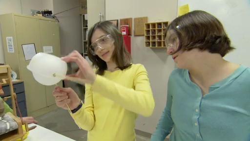 Laci and Clarasophia each make their own prototype for the puppet's moving eyes.