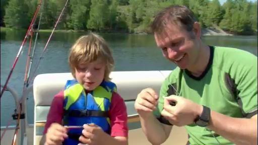 Chris and Martin go fishing at the lake with their buddies.