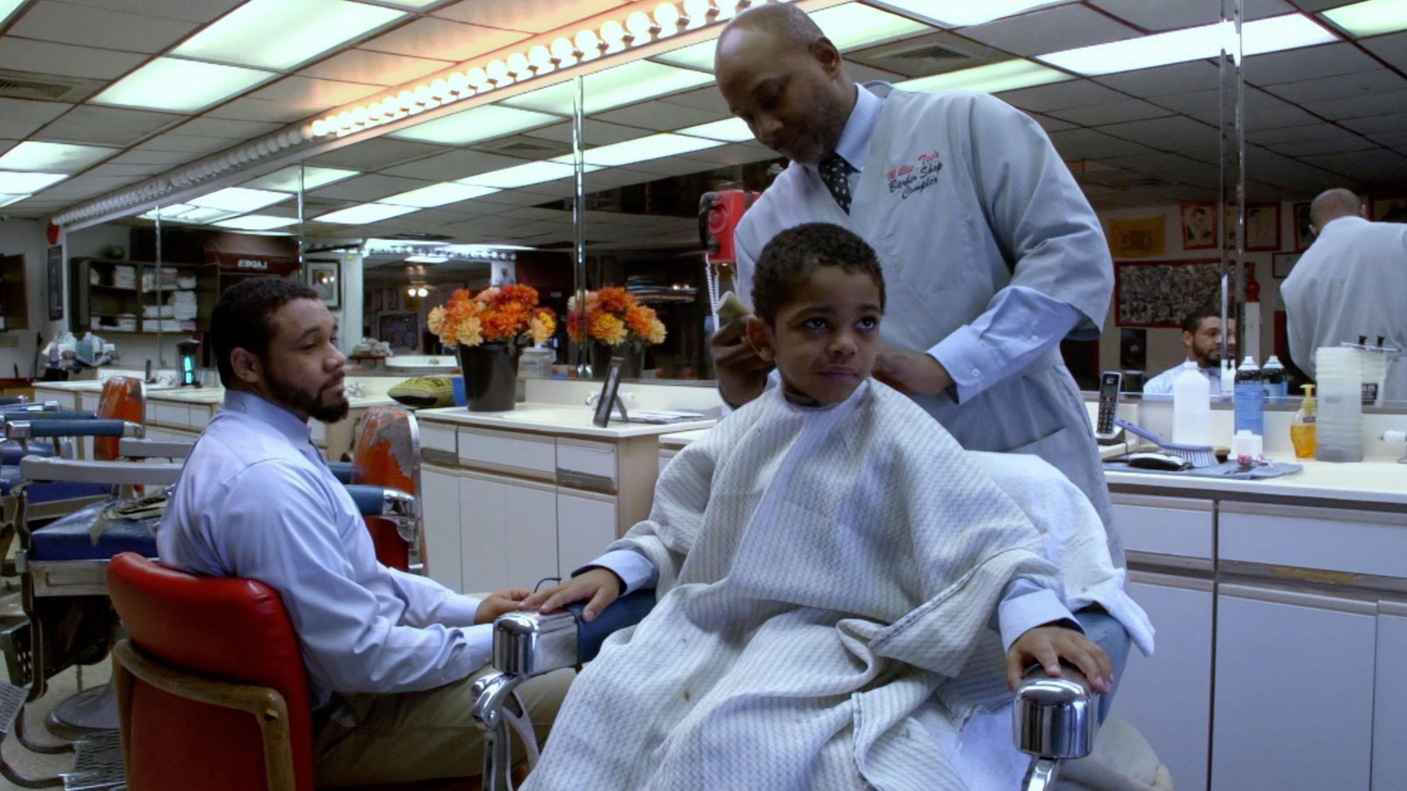It's BJ's first visit to the barbershop. His dad knows it can be a little scary.