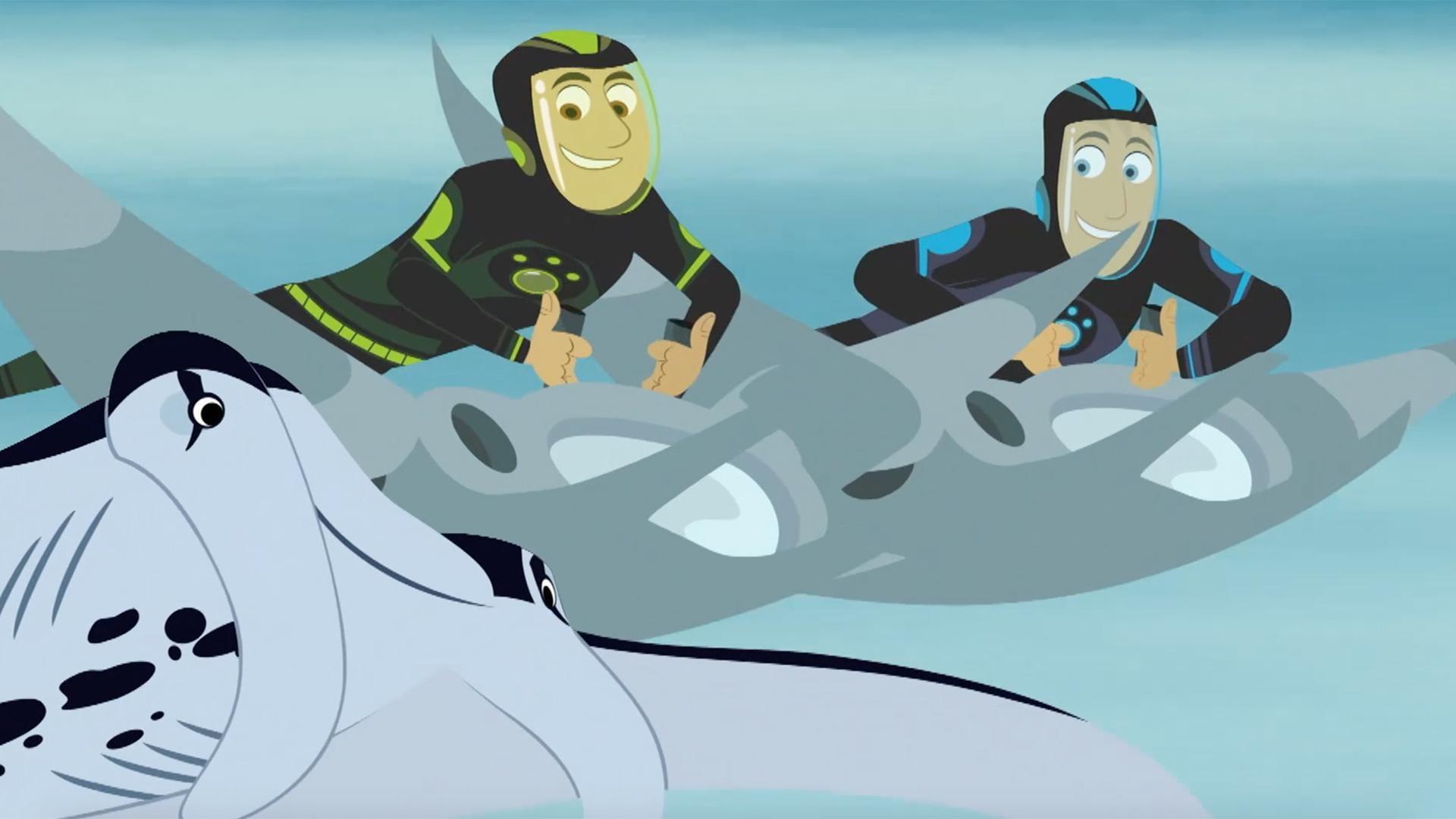 The Kratts leap out from underwater using manta ray-like devices.