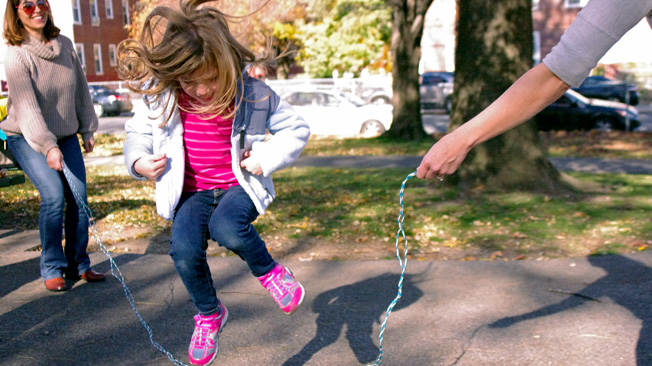 Girl jumps
rope